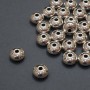 Furnitura jubilerska – koralik-wkładka wewnętrzna, średnica 1,7 mm +/-; średnica 7×4,5 mm +/-; opakowanie 20 g 25 szt. (+/-)