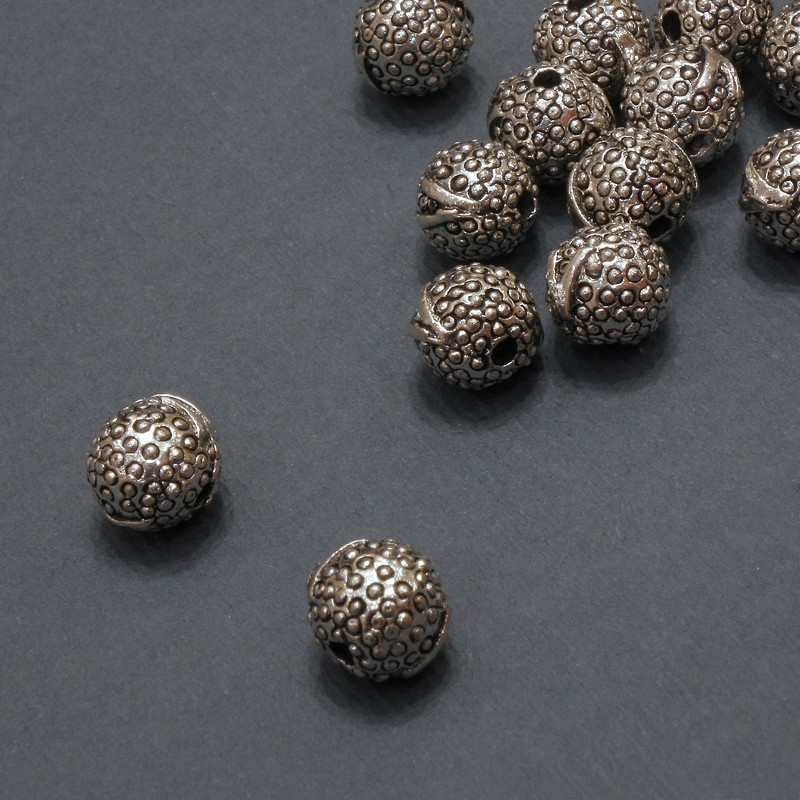 Koralik-wkładka wewnętrzna, średnica 1,5 mm +/-; średnica 7 mm +/- opakowanie 20 g 14 szt. (+-)