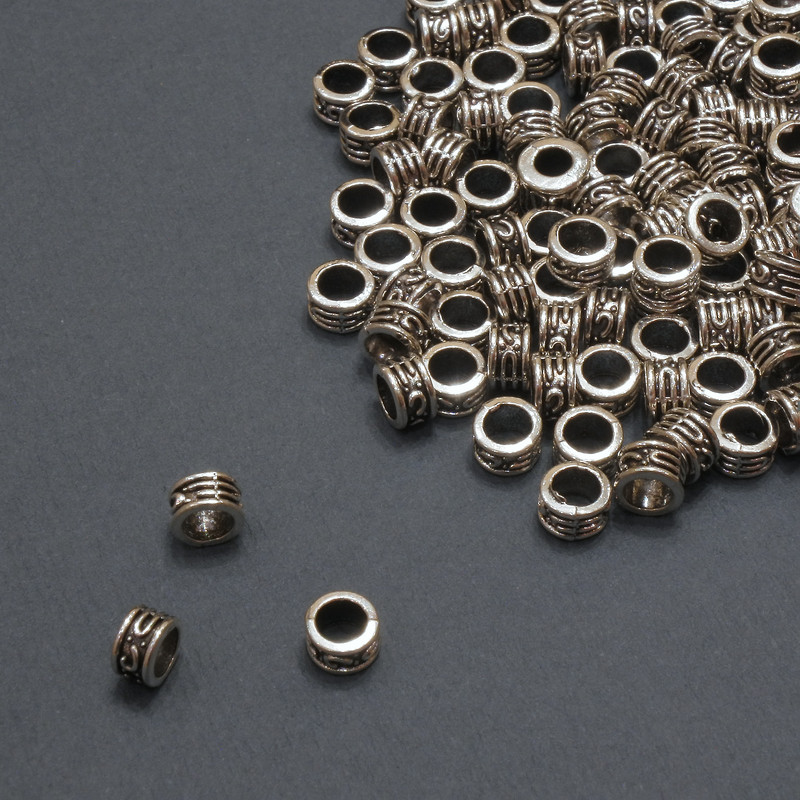 Furnitura jubilerska: koralik-wstawka wewnętrzna, średnica 3,2 mm; zewnętrzna 5×3 mm; opakowanie 20 g, 134 szt. (+ -)