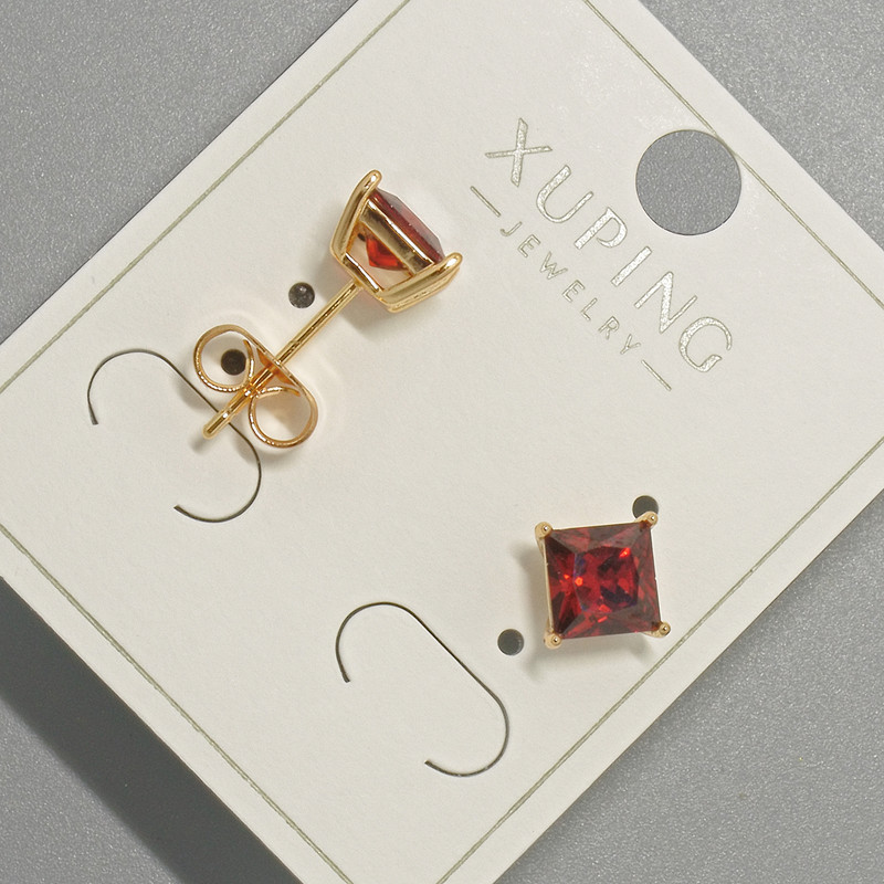 Kolczyki sztyfty Xuping z czerwonym kryształem, średnica ok. 6 mm, złocenie 18K
