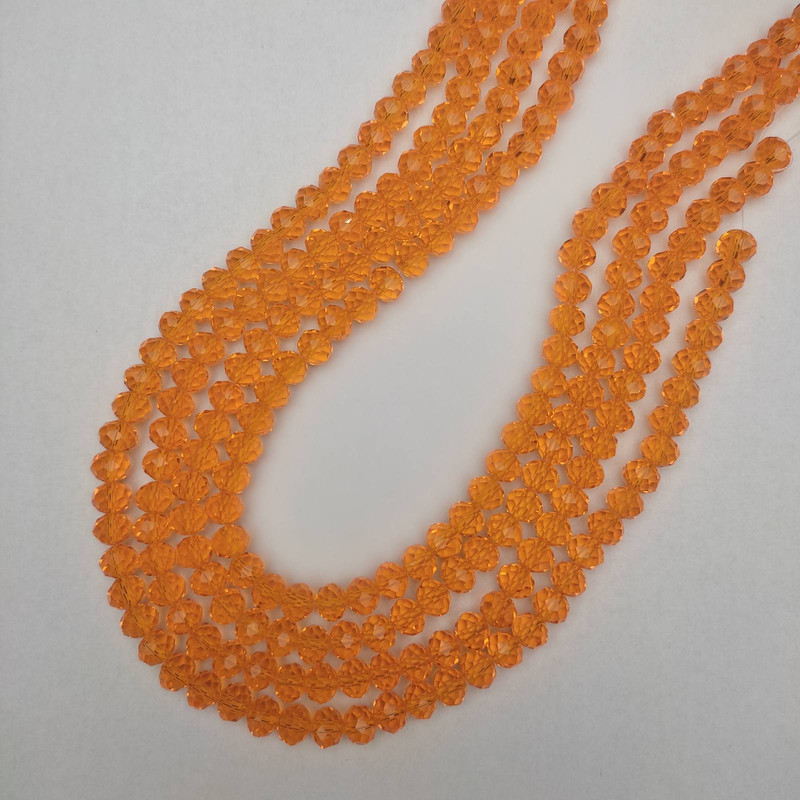 Koraliki czeskiego kryształu, pomarańczowe, fasetowane, w kształcie rondeli, średnica 8x6 mm, długość 41 mm, na żyłce