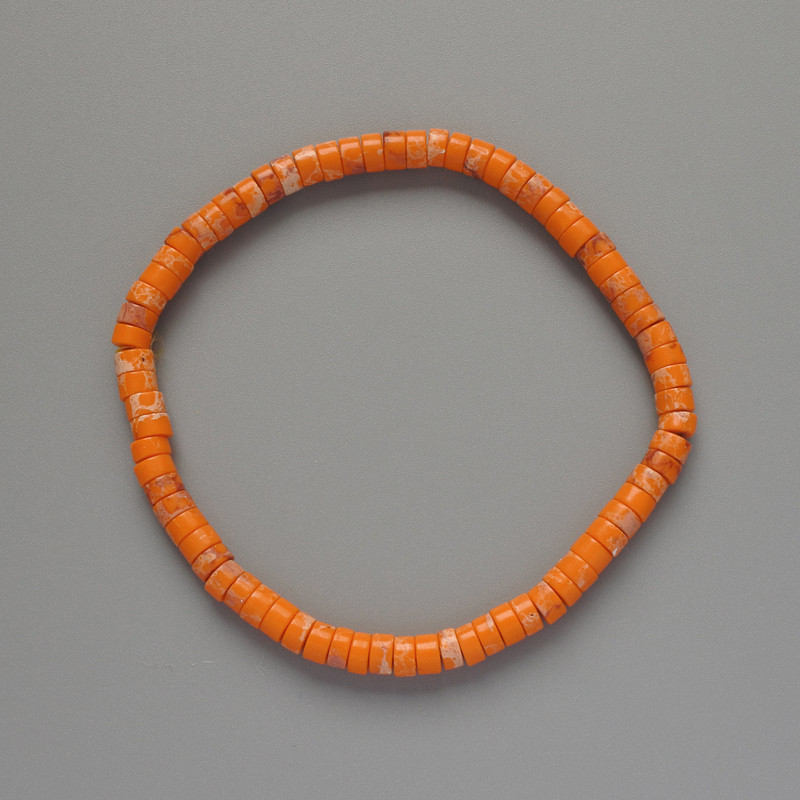 Bransoleta z pomarańczowego varyscytu (prasowanego) dysk o wymiarach 4,5×2,5 mm, długość 18 cm, elastyczna