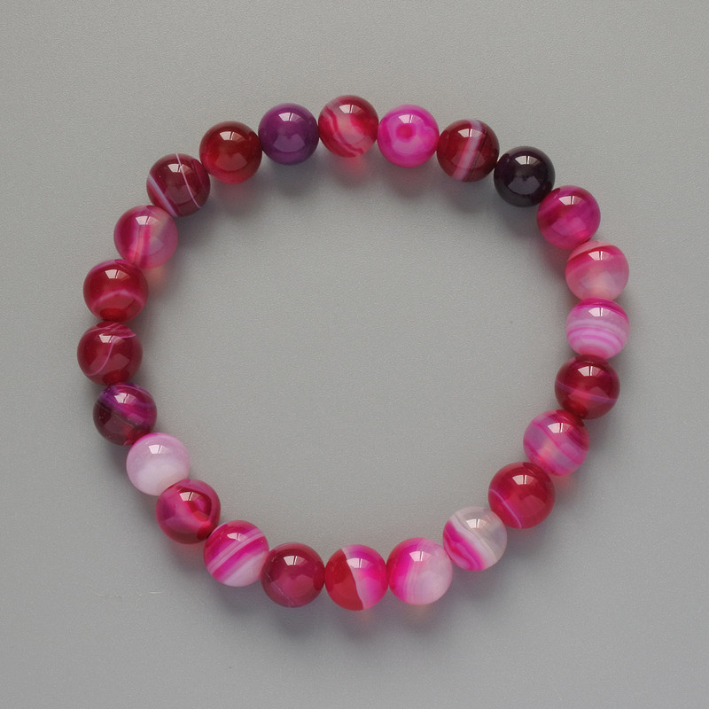 Bransoletka z agatu malinowego, naturalny kamień, gładkie kuleczki o średnicy 8 mm ±, długość 18 cm ± (na elastycznej gumce)