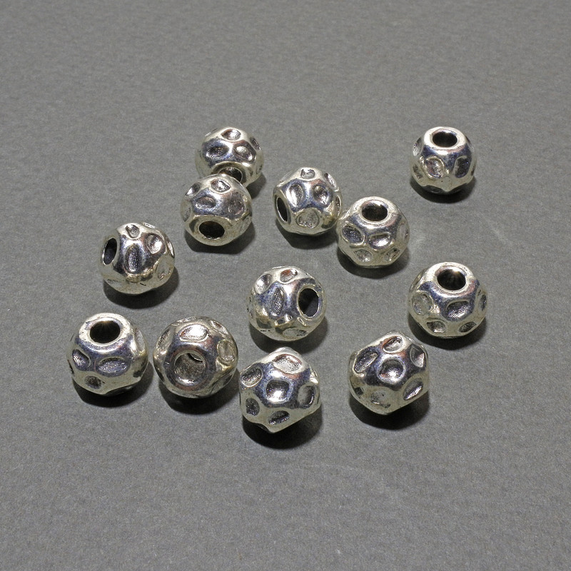 Koralik-wstawka do biżuterii, średnica 9×7,5 mm, średnica wewnętrzna ok. 3 mm, opakowanie 12 sztuk ± 20 g