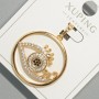 Wisiorek «Oko» Xuping z białymi i czarnymi kryształami, średnica około 26 mm, długość około 33 mm, pozłacanie 18K