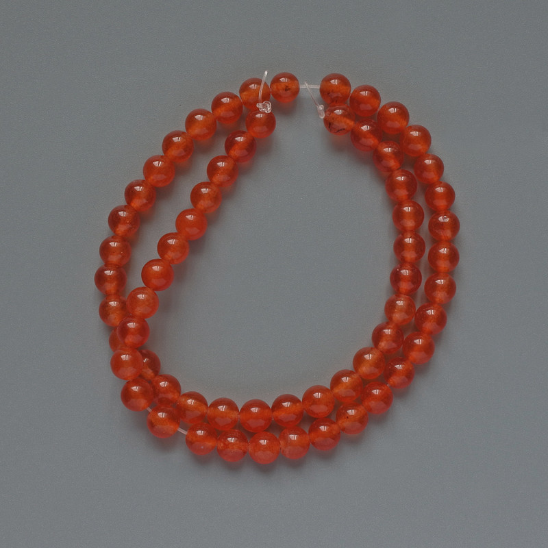 Koraliki karneolu sztucznego, gładka kuleczka, średnica 6 mm ±, długość 38 cm ± na żyłce