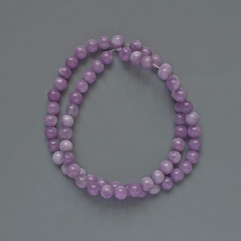 Koraliki kunzytu syntetycznego - gładkie kuleczki, średnica 6 mm ±, długość 39 cm ± na nici