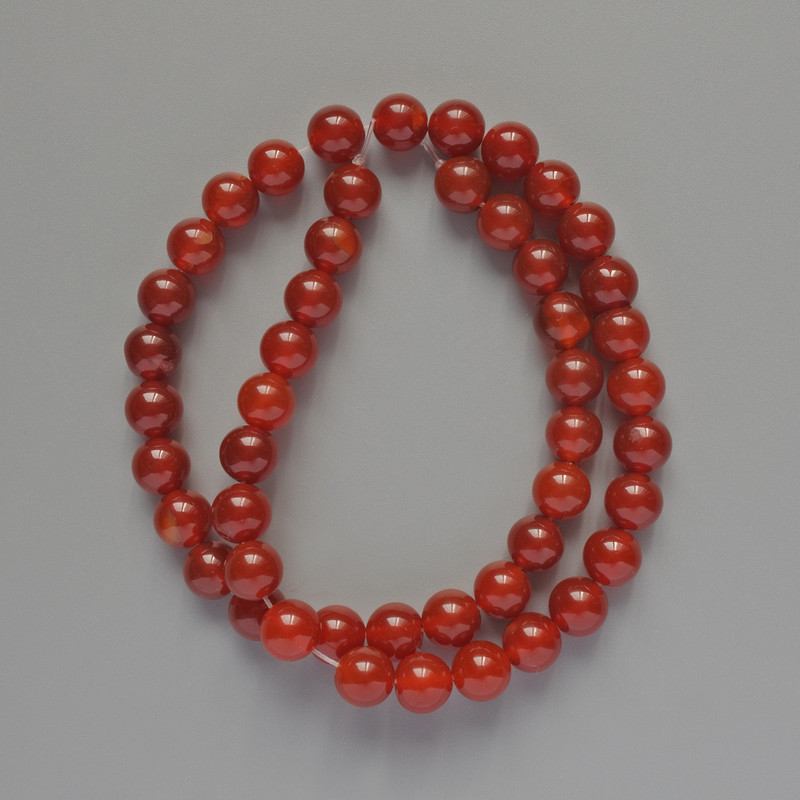 Koraliki karneolu – naturalny kamień, gładkie kulki, średnica 8 mm, długość 36 cm na nitce