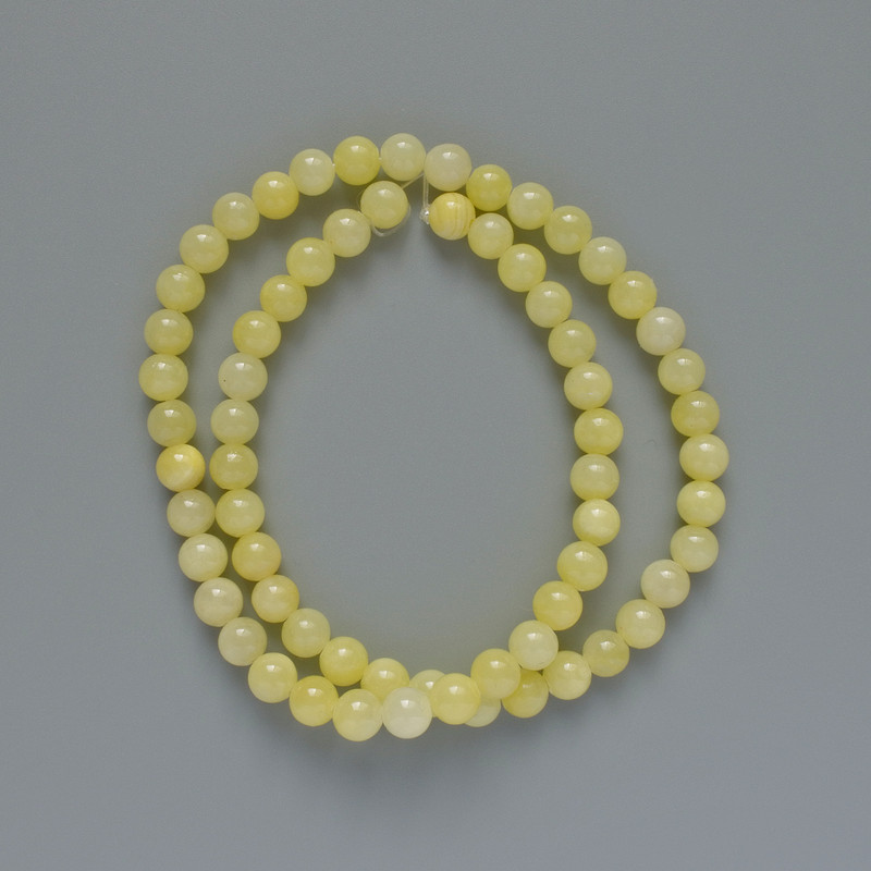 Koraliki cytrynowe (sztuczny akryl) gładkie kuleczki, średnica 6,5 mm, długość 40 cm, na żyłce