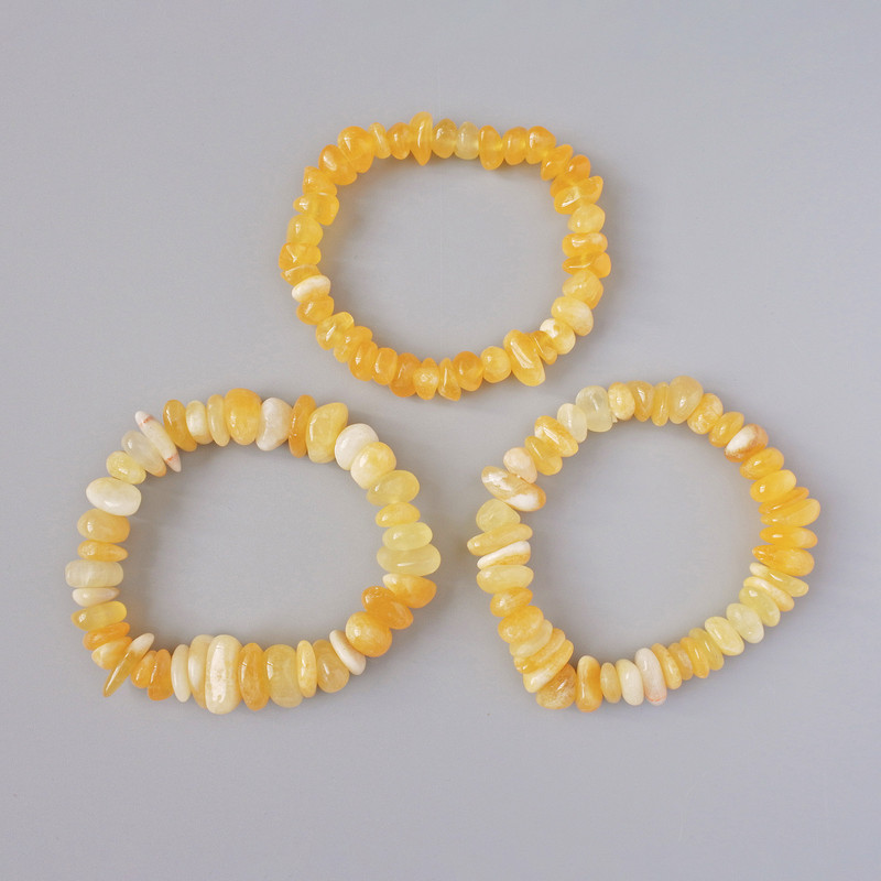 Bransoletka z żółtego agatu, naturalny kamień, kuleczki o średnicy od 14×7 mm do 8×6 mm, długość 18 cm, elastyczna, w rozmiarach różnych