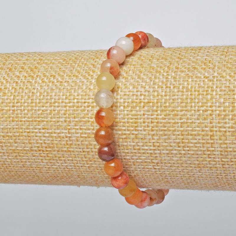 Bransoletka z karneolu (prasowany) - gładka kulka, średnica 6,5 mm, długość 18 cm, elastyczna
