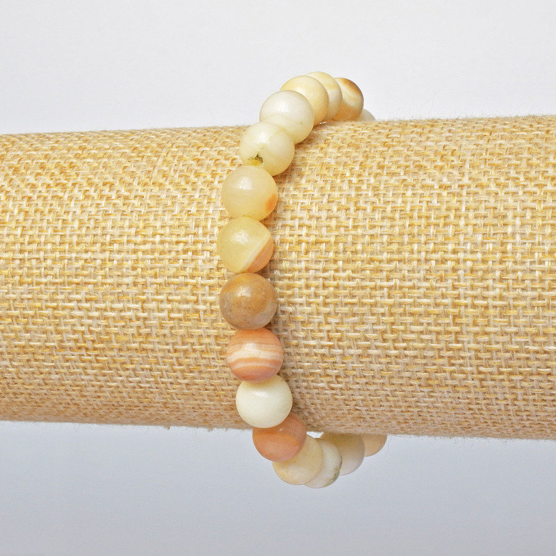Bransoletka z żółtego agatu (prasowany) – gładkie kuleczki, średnica 8,5 mm ±, długość 18 cm ± (rozciągliwa)