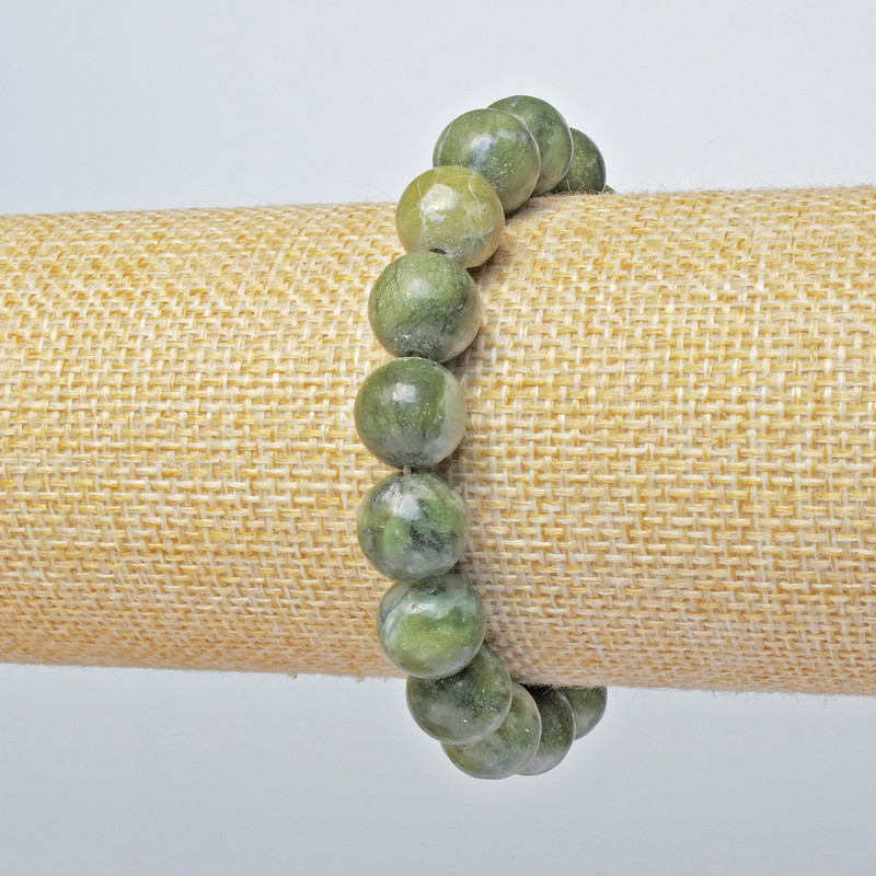 Bransoletka z jadeitu (prasowana) – gładkie kulki, średnica 10,5 mm ±, długość 18 cm ± (rozciągana)