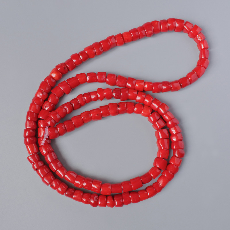 Koraliki z naturalnego korala — fasetowane, średnica 12×8 mm, długość około 110 cm na żyłce