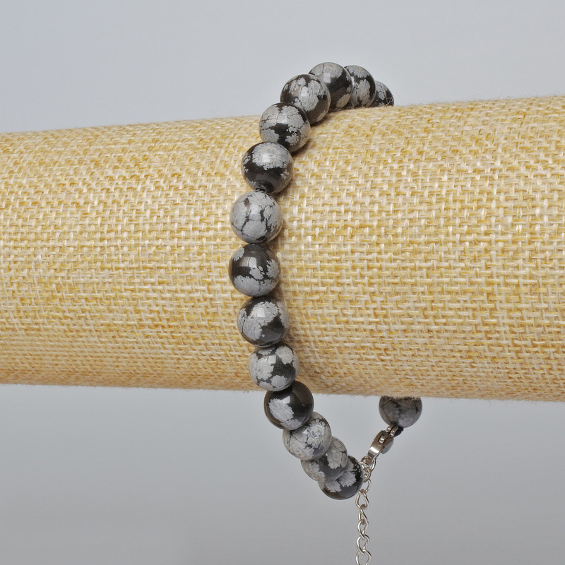 Bransoletka z śnieżnego obsydianu (prasowany) – gładka kulka, średnica 8,5 mm + -, długość 19-24 cm + - (srebrzysta klamra)