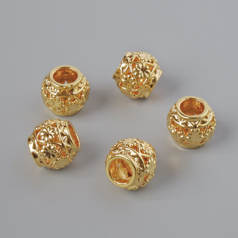 Koralik-wkładka złotego koloru, średnica 6×7 mm, otwór 3,3 mm, 1 szt.