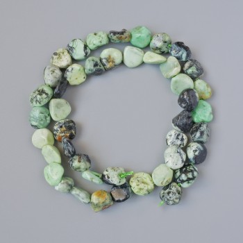 Koraliki walit – naturalny kamień, w kształcie galetki, średnica 10 mm +/-; długość 40 cm +/- na nici