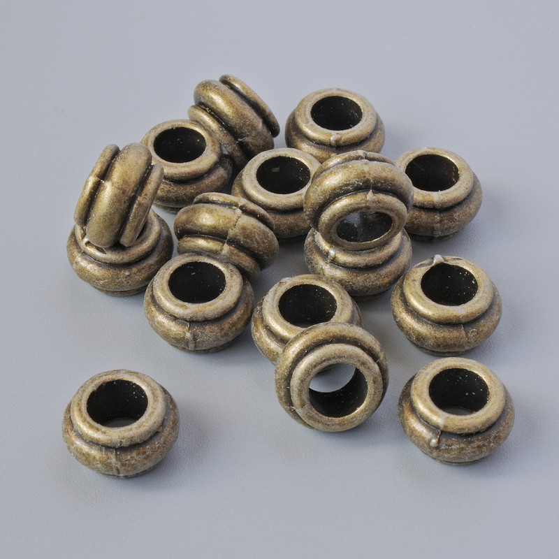 Wkładka koralikowa – okucie, średnica 9×5,5 mm, średnica otworu 4,7 mm, opakowanie 16 szt. ±, kolor metalu: brązowy
