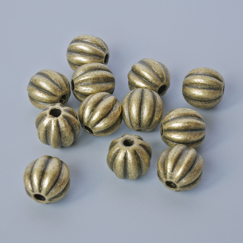 Koraliki-wkładki, średnica 7,5×8 mm, średnica otworu 1,5 mm, zestaw 12 sztuk, kolor metalu: brązowy