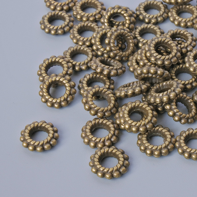 Okucie – wkładka do koralików, średnica 7,5×2 mm, średnica otworu 3,3 mm, opakowanie 54 szt. +/- kolor metalu brązowy