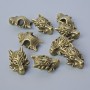 Koralik-wkładka „Smok”, wymiary 18×13×8 mm, średnica otworu 3,7 mm, opakowanie 9 szt. ±, kolor metalu brązowy