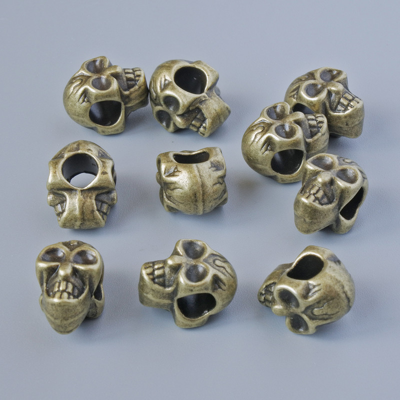 Koralik-wstawka «Czaszka», średnica 12×8×9 mm, średnica otworu 4,5 mm, opakowanie 10 szt. ±, kolor metalu brązowy