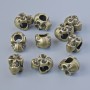 Koralik-wstawka «Czaszka», średnica 12×8×9 mm, średnica otworu 4,5 mm, opakowanie 10 szt. ±, kolor metalu brązowy