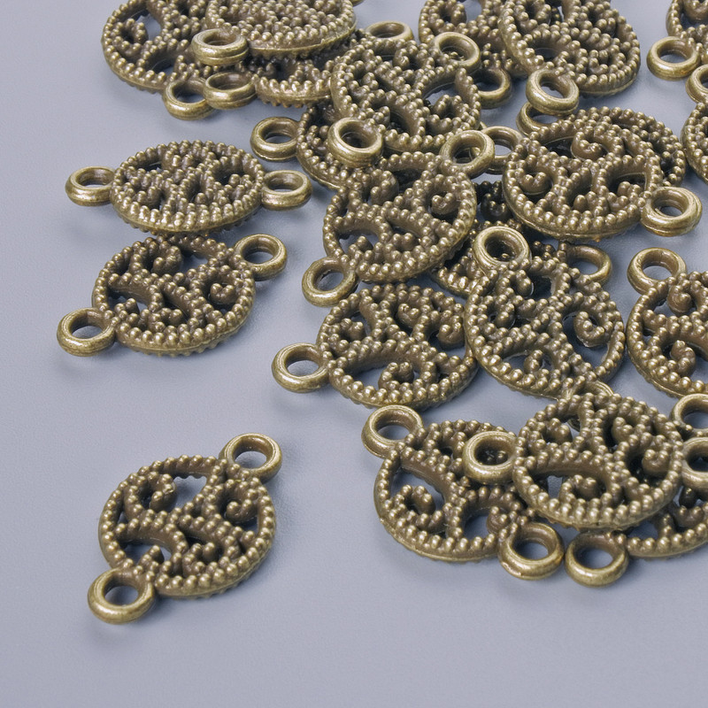 Zawieszka do biżuterii, średnica 17×10,5 mm, średnica otworu 1,9 mm, opakowanie 24 szt. ±, kolor metalu: brązowy