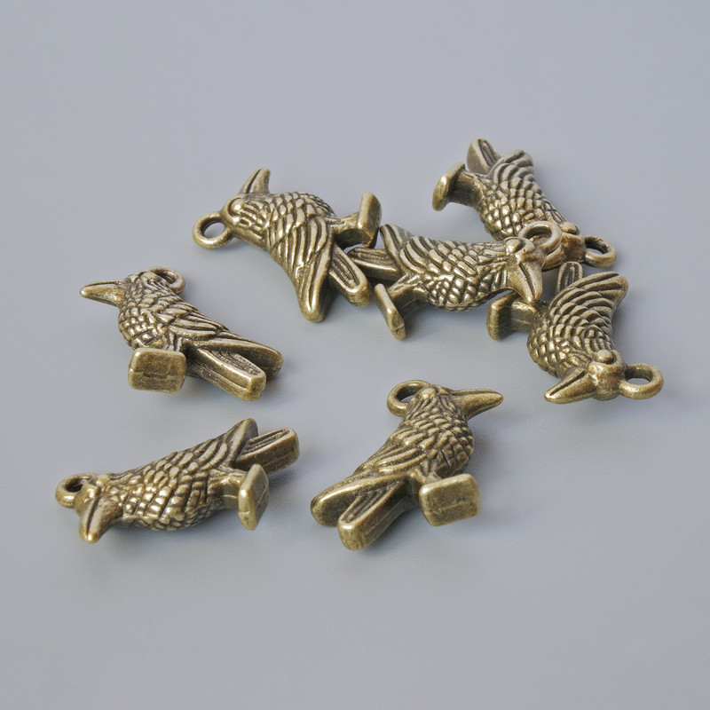 Zawieszka ozdobna „Ptaszek”, średnica 18×13 mm, średnica otworu 1,9 mm, opakowanie 7 szt. ±, kolor metalu brązowy