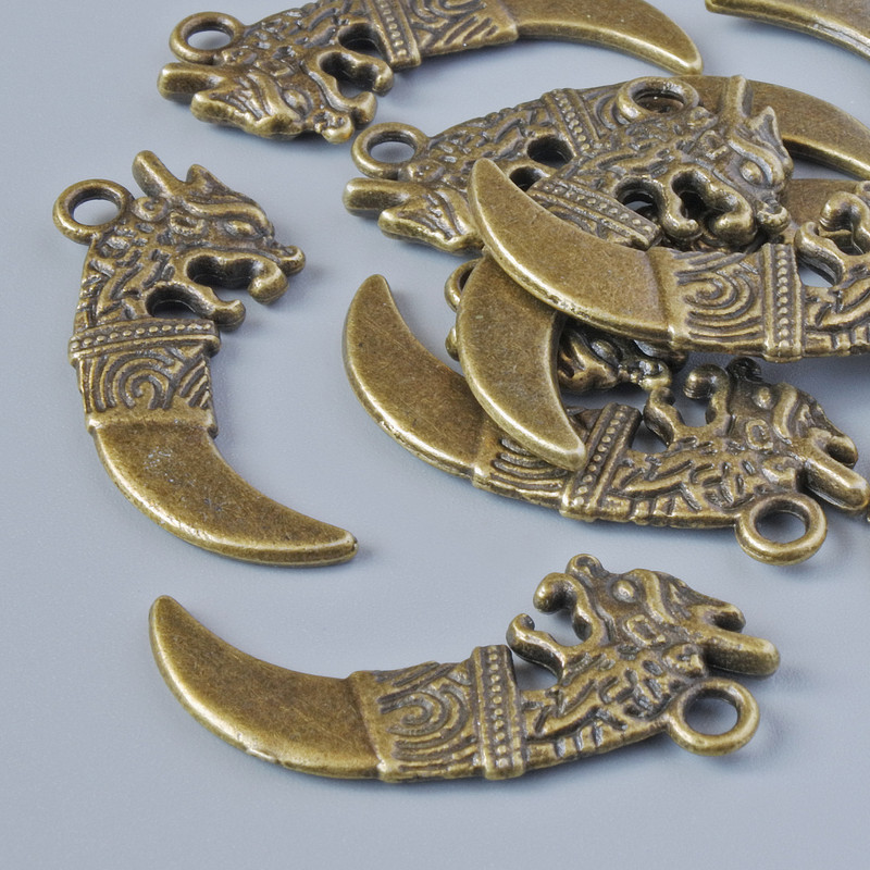 Zawieszka „Kinżal”, średnica 29×13 mm, średnica otworu 2,1 mm, opakowanie 10 szt. ±, kolor metalu: brązowy