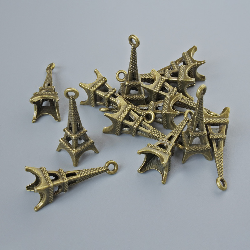 Zawieszka biżuteryjna 'Wieża Eiffla', średnica 20×9 mm, średnica otworu 1,5 mm, opakowanie 15 szt. ±, kolor metalu brązowy