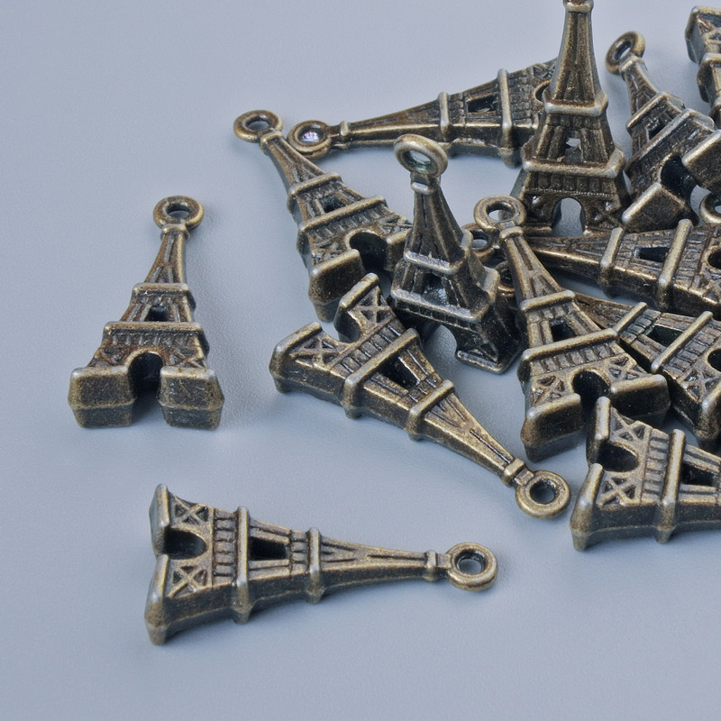Okucia biżuteryjne - wisiorek „Wieża Eiffla”, średnica 26×9 mm, średnica otworu 1,7 mm, zestaw 13 szt. ± kolor brązowy metalu