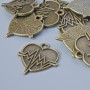 Zawieszka 'Serce', brązowy kolor metalu, wymiary 22x20 mm, grubość 5 mm, średnica otworu 1,9 mm, opakowanie 10 szt.