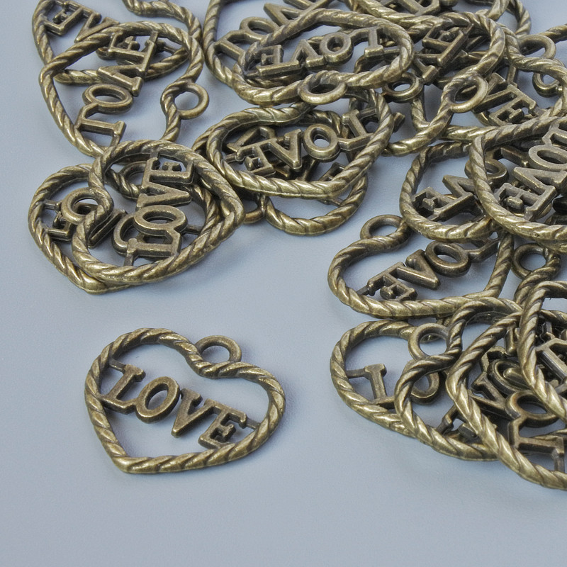 Zawieszka jubilerska w kształcie serca, rozmiar 13,5×14,5 mm, średnica otworu 1,9 mm, opakowanie 28 szt. ±, kolor metalu: brązowy