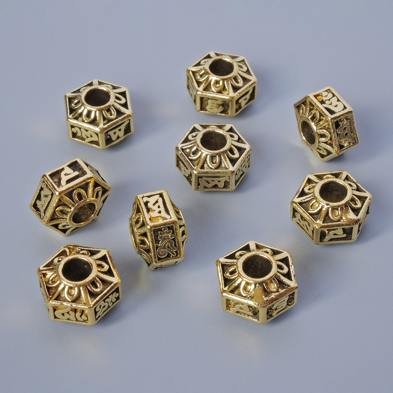 Okucie do koralików – wstawka, średnica 7×10 mm, średnica otworu 3,5 mm, fasetowane, 9 szt. ± 20 g, złoty kolor metalu