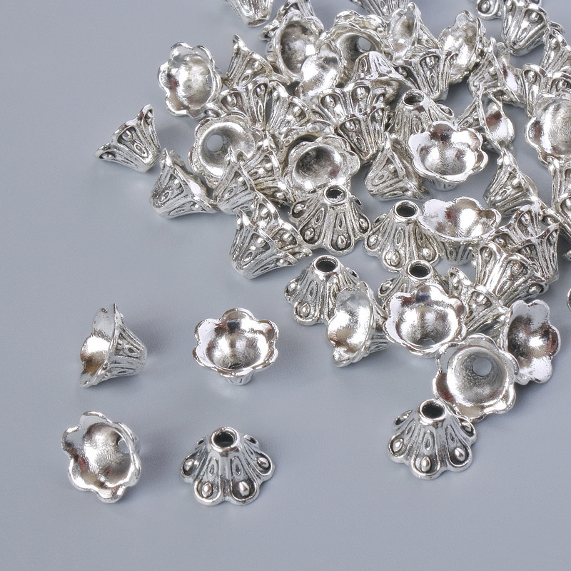 Końcówka jubilerska, rozmiar 8x5 mm, średnica otworu 1,7 mm, opakowanie 20 g ±, srebrzysty kolor metalu ~57 szt.