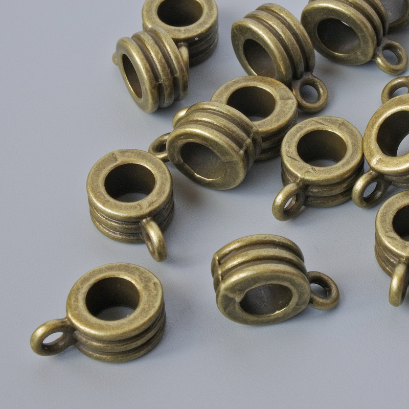 Okucia jubilerskie – uchwyt do zawieszki, średnica 4,5×8 mm, średnica otworu 1,8 mm, długość 12 mm, opakowanie 20 szt. +/- kolor metalu brązowy