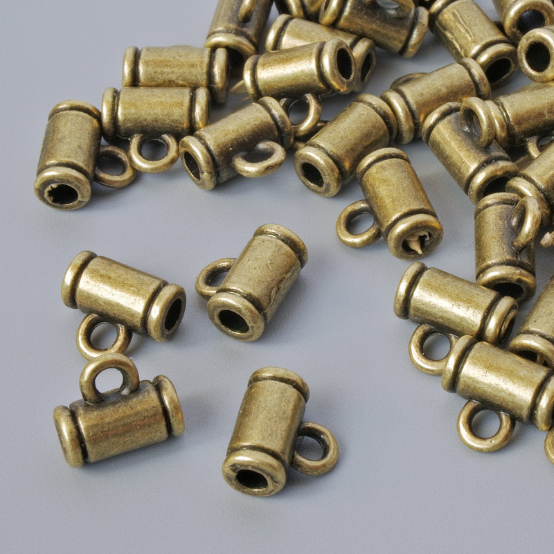 Furnitura bail – uchwyt, wymiary 8×4 mm, średnica otworu 1,8 mm i 2,1 mm, długość 7,2 mm, opakowanie 40 szt., kolor metalu brązowy, masa 20 g