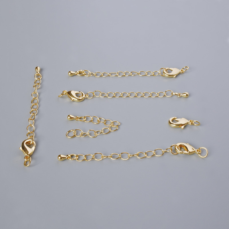 Zapięcie karabinkowe, średnica 12×6 mm z przedłużanym łańcuszkiem, długość 5,5 cm, złocisty kolor metalu, 1 szt.