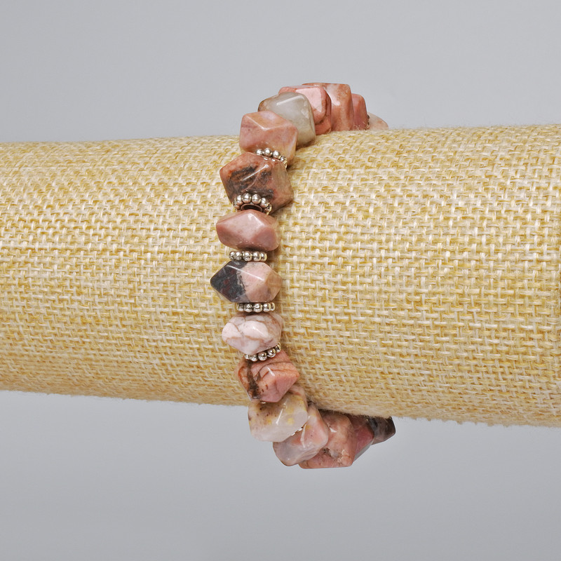 Bransoletka z rodonitu — naturalny kamień, granowane rondelki, średnica 10×7 mm, długość 18 cm, elastyczna, z metalowymi wstawkami