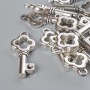 Zawieszka w kształcie klucza 25×11 mm fas., 12 szt. ±20 g ±, kolor metalu: srebrzysty