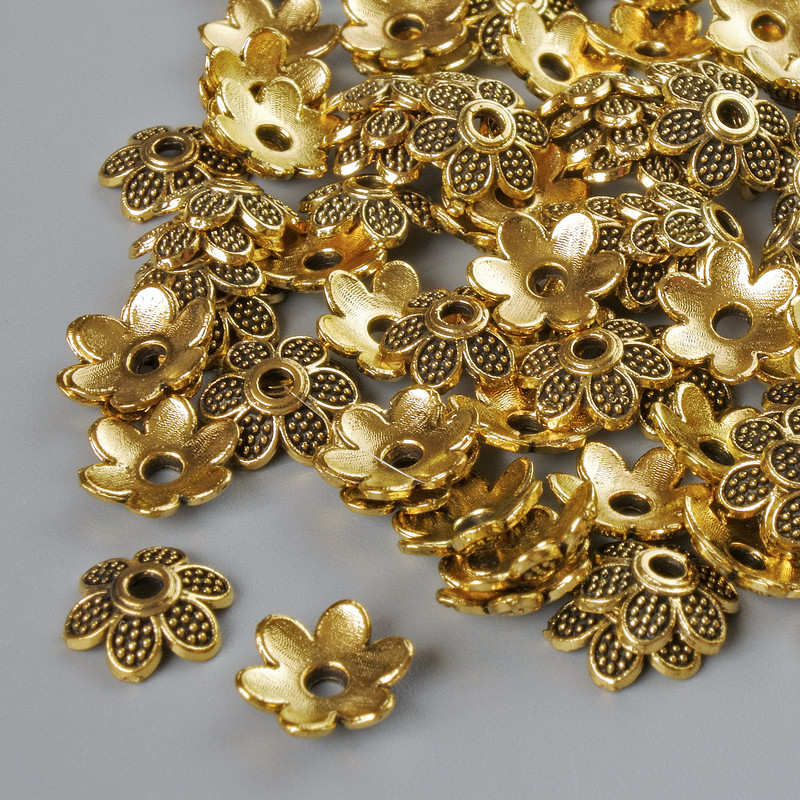 Końcówki do biżuterii, średnica 7×2 mm, średnica otworu 1,5 mm, opakowanie 20 g ±, złoty kolor metalu ~120 szt.
