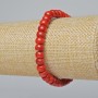 Bransoletka z naturalnego koralu, gładkie rondelki o średnicy około 7×5 mm, długość około 18 cm (na elastycznej bazie)