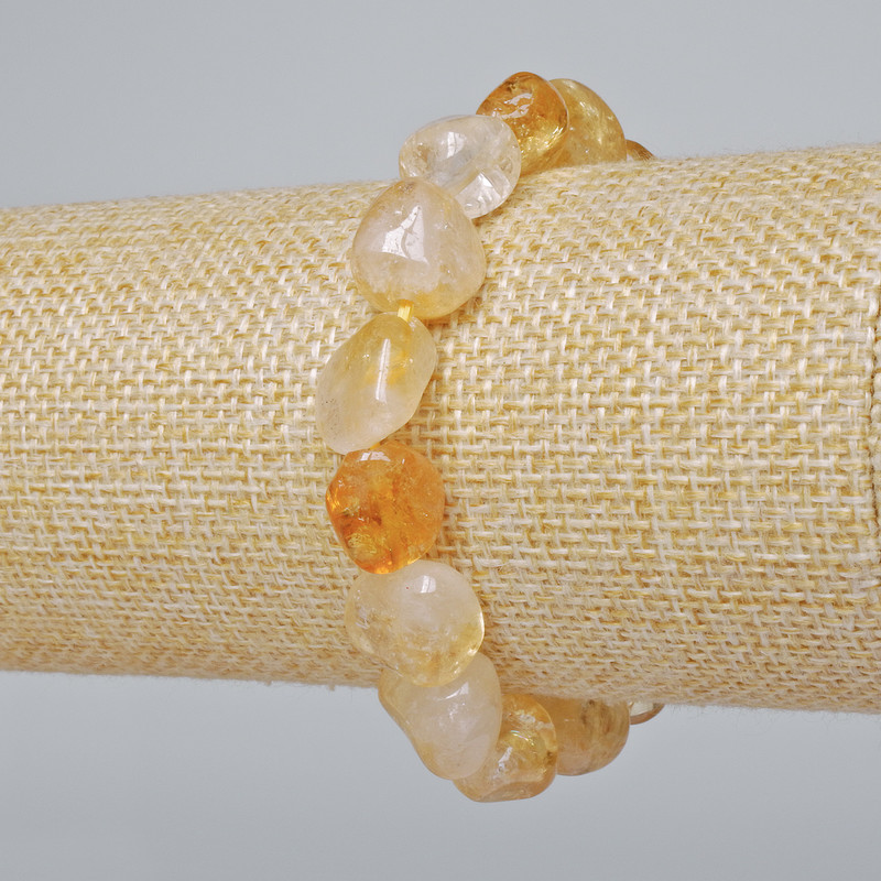 Bransoletka z naturalnego cytrynu, fasetowany kamień, średnica 10×13 mm, długość 18 cm (na elastycznej gumce)