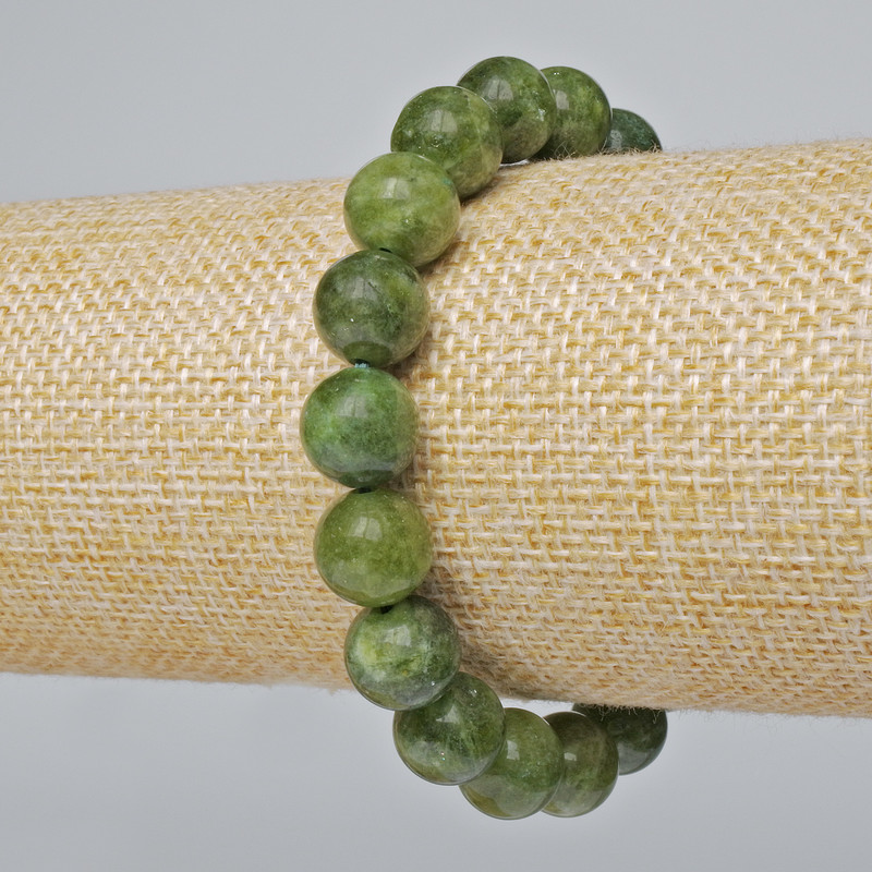 Bransoletka z jadeitu — kule gładkie, średnica 10 mm, długość 18 cm (na elastycznej gumce)