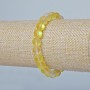 Bransoletka z żółtego szkła opalowego, gładka kulka, kolor żółty matowy z efektem kameleona, średnica 8 mm, długość 18 cm (rozciągliwa)