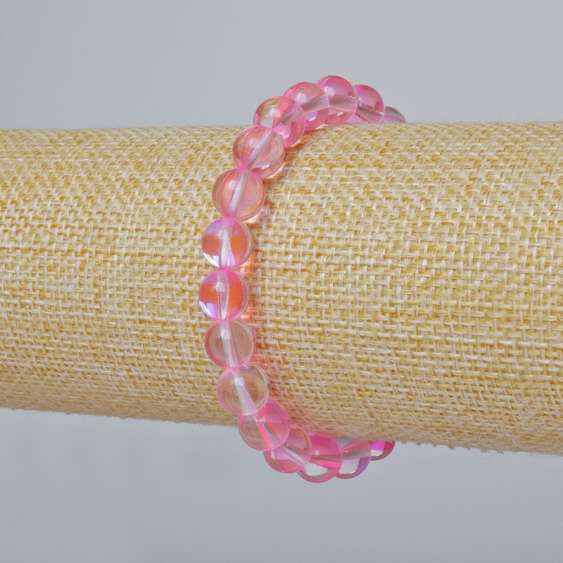 Bransoletka ze szkła opalowego, gładkie kulki, kolor różowy przezroczysty, efekt kameleona, średnica ok. 8 mm, długość ok. 18 cm (rozciągliwa)