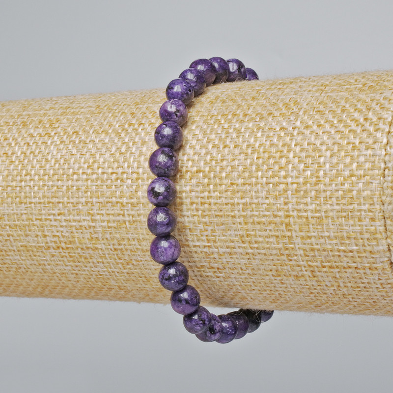 Bransoletka z sugilitu (gładkie kule), średnica 6,5 mm, długość 18 cm (rozciągliwa)
