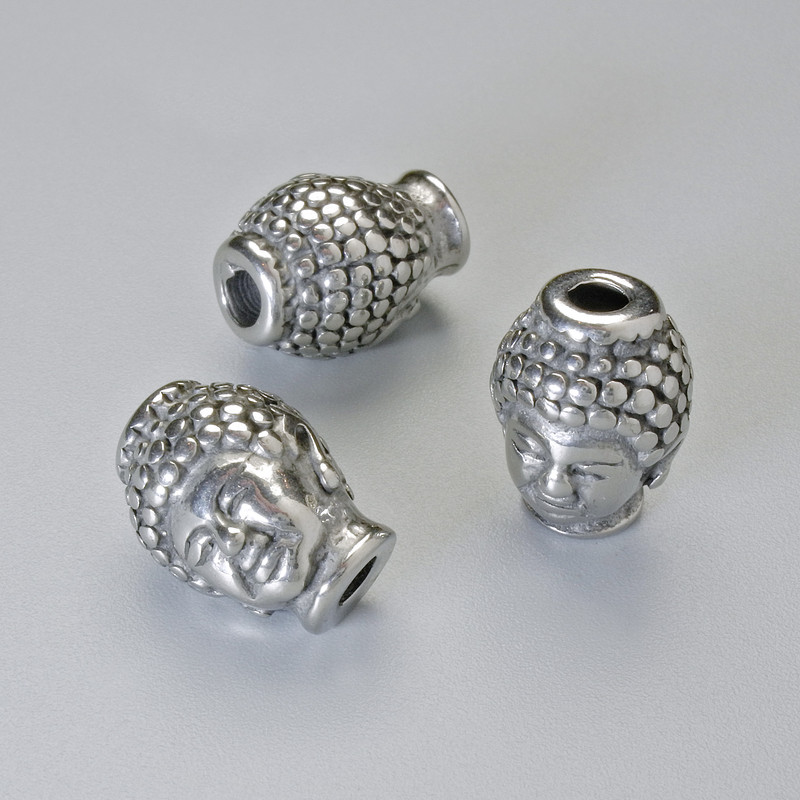 Koralik-wkładka „Budda”, średnica 13×10 mm, otwór o średnicy ok. 2,7 mm, srebrzysty kolor metalu, 1 szt.