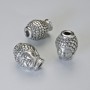 Koralik-wkładka „Budda”, średnica 13×10 mm, otwór o średnicy ok. 2,7 mm, srebrzysty kolor metalu, 1 szt.